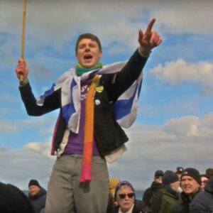 Frankie Rufolo giving a speech and pointing, at the Newquay demonstration